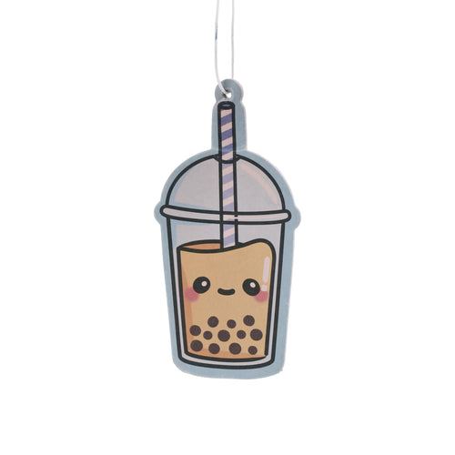 Front view of a cute bubble tea air freshener in beige and light blue colours, featuring a smiling face, pink cheeks, boba pearls, a striped straw, and a hanging string.