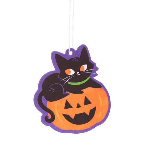 Front view of an air freshener shaped like a black cat with orange eyes, white whiskers, and a green collar, sitting atop an orange jack-o'-lantern pumpkin with a carved smiling face. The air freshener features a purple border and is suspended by a white string.