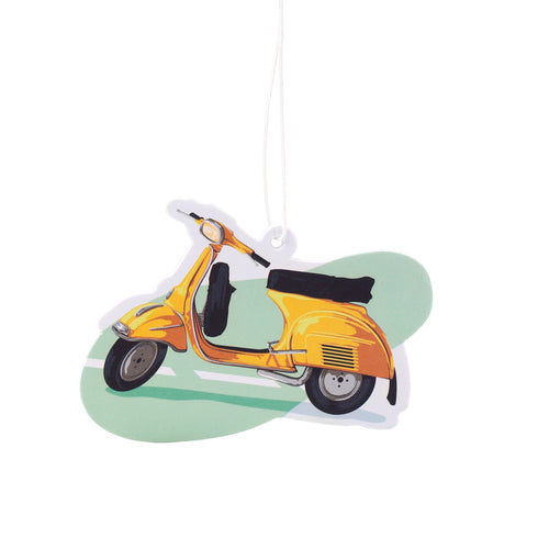 Side view of a yellow scooter-shaped air freshener on a light green background with white lines, featuring a white hanging string.