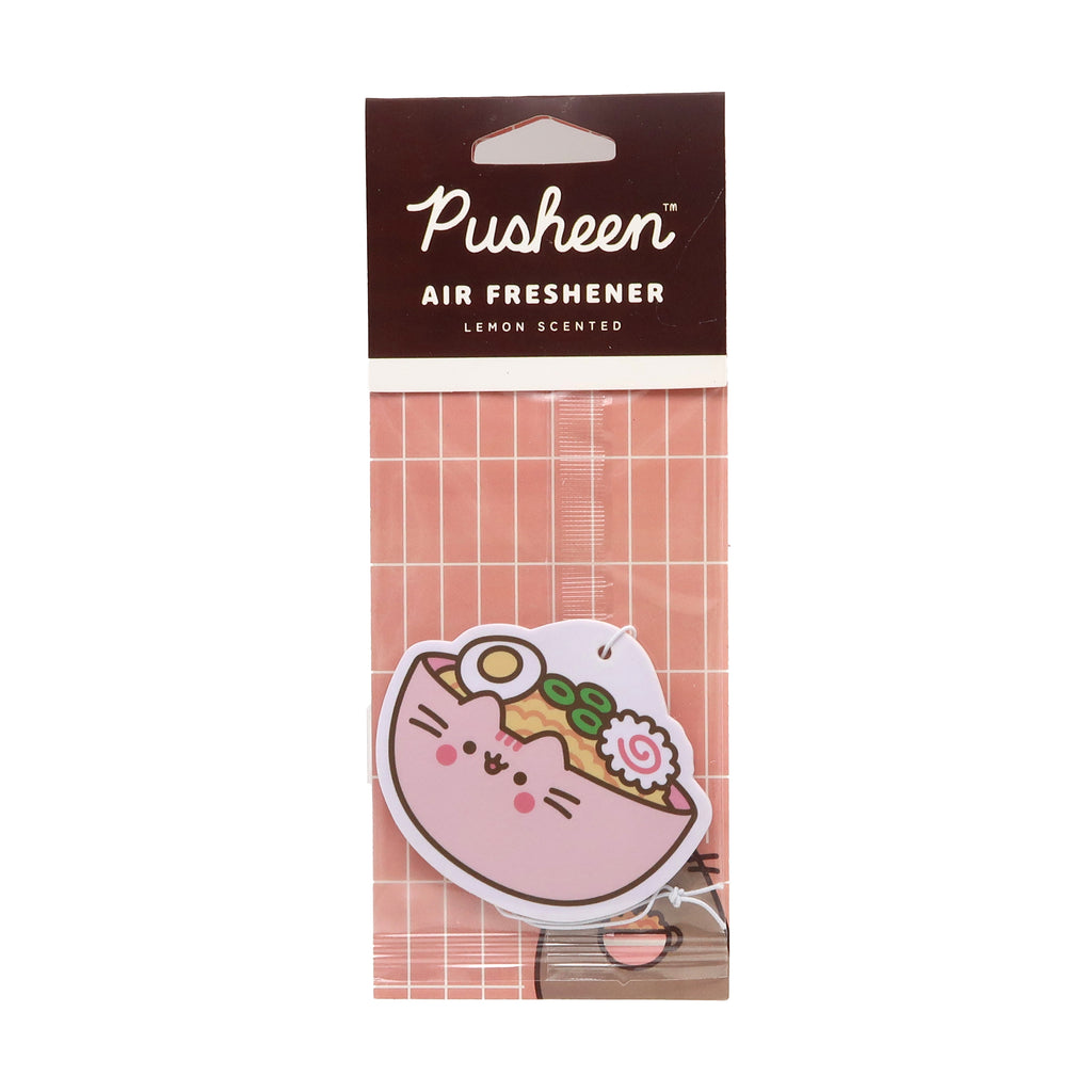 Front view of a lemon scented air freshener, depicting a pink cartoon cat in a ramen bowl, sealed in retail packaging.