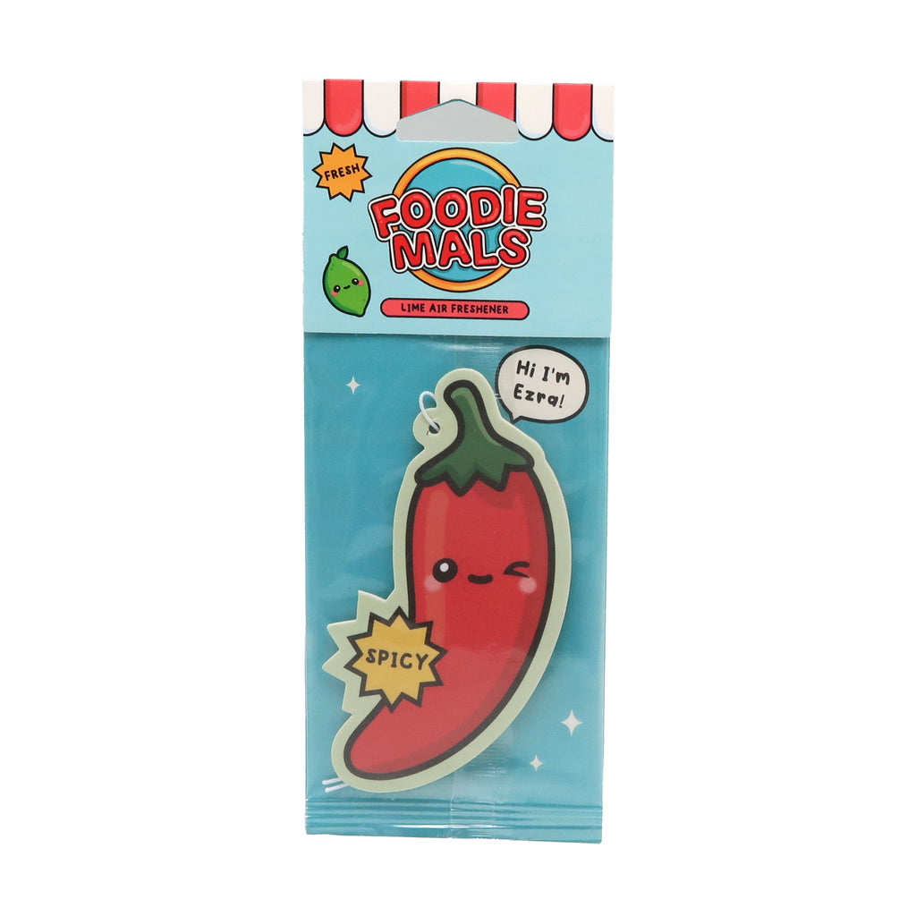 Front view of a red cartoon chilli pepper-shaped lime scented air freshener, featuring a winking face and green stem, presented in light blue plastic packaging with a red and white striped header, and displaying 'FOODIE MALS' branding.