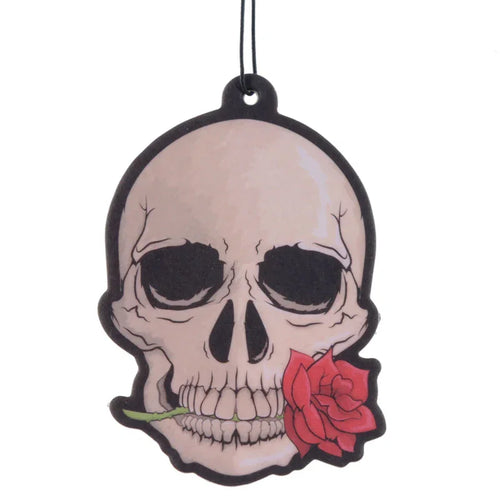 Front view of an air freshener shaped like a light beige skull with black details, depicting a vibrant red rose in its mouth, complete with a black hanging string.