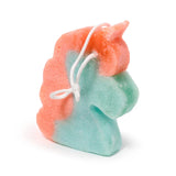 Coral and light blue unicorn head soap sponge, depicting its mane, horn, and a white hanging cord.