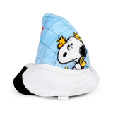Angled view of a blue quilted plush travel blanket featuring Snoopy and Woodstock, partially stored in a white and black zipped plush toy pouch.
