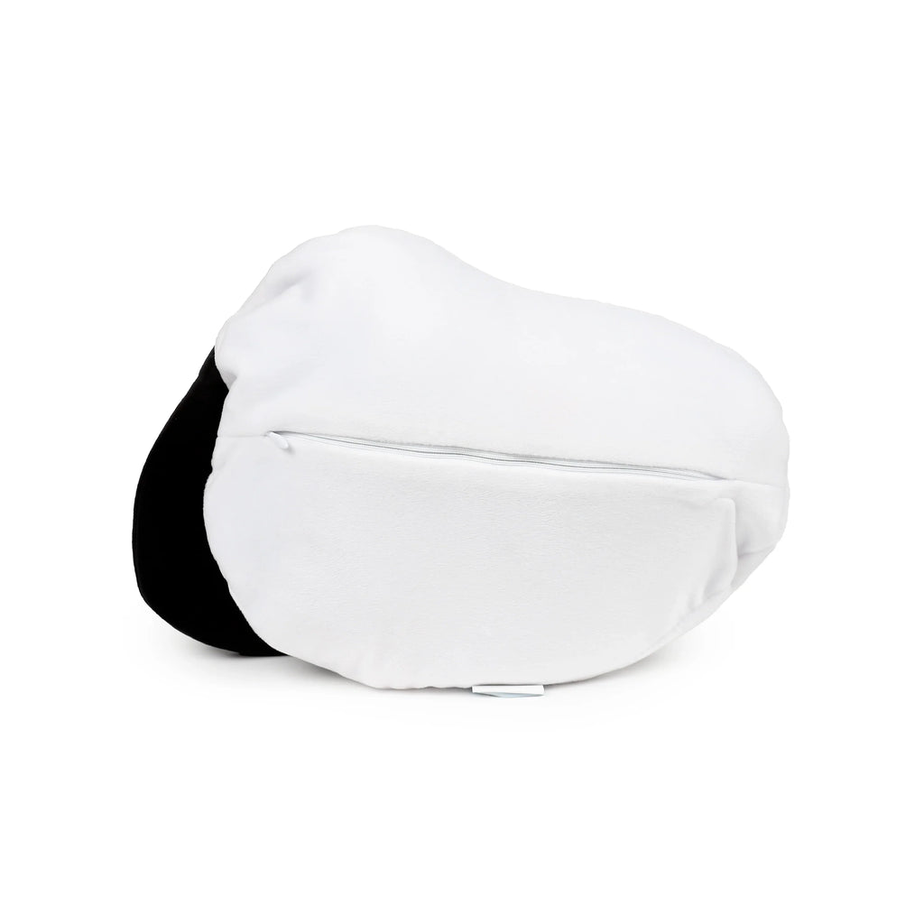Angled view of the 2-in-1 white and black Snoopy plush toy, in its folded form with a visible central zip.