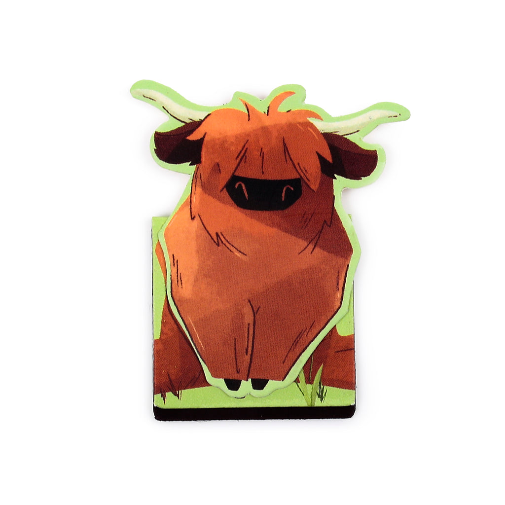 Straight-on view of a magnetic bookmark depicting a brown Highland cow (Hairy Coo) with shaggy fur covering its eyes and short horns, outlined in light green.
