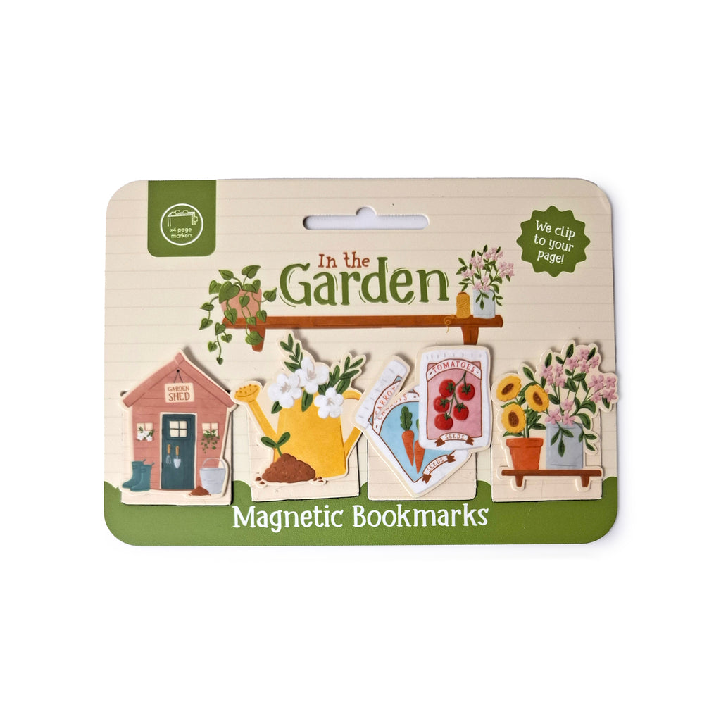 Front view of a magnetic bookmark set, titled 'In the Garden' on its packaging, featuring illustrations of a garden shed, watering can, seed packets, and potted flowers.