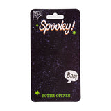 Front view of a black, speckled Halloween-themed bottle opener packaging card. It features 'Spooky!' text, a spiderweb, a 'Boo!' speech bubble, and green 'BOTTLE OPENER' text, with a hanger slot.