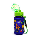 Angled view of a blue children's water bottle with a space design, featuring a red rocket, astronaut, and alien. It has a bright lime green pop-top lid open and a matching green carry strap with a black buckle.