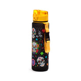 A black 600ml shatterproof water bottle with a colourful Day of the Dead skull and floral pattern, featuring a yellow translucent pop-top lid and a yellow strap with a black buckle.