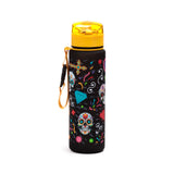 Angled view of a black water bottle with a yellow pop-top lid and clear yellow mouthpiece. The bottle features a vibrant Day of the Dead design, including colourful sugar skulls, crosses, hearts, and geometric shapes, with a yellow carry strap attached.