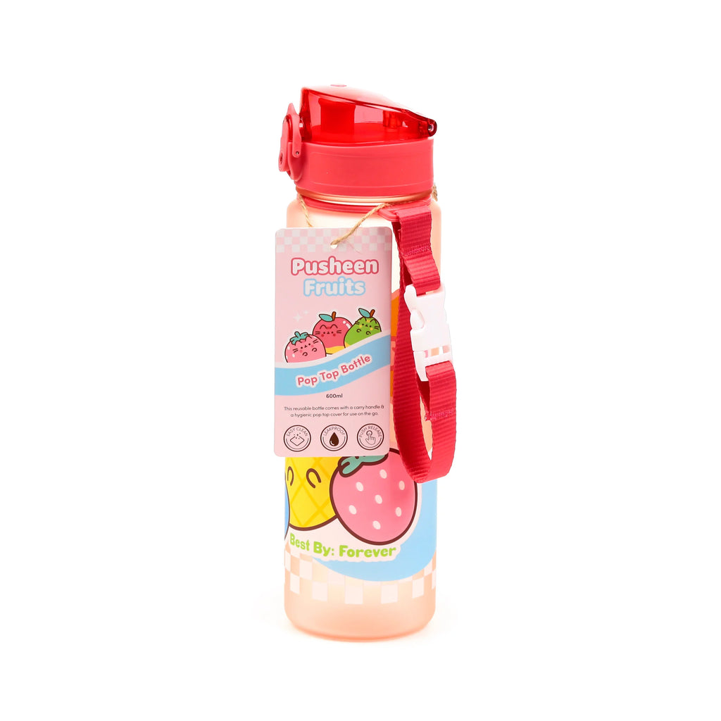 Front view of a 600ml shatterproof pop top water bottle with a red lid and a red carry strap. The translucent peachy bottle features a design of cat-faced fruit characters including strawberries, pineapples, apples, and pears. A product tag is attached, showing similar fruit illustrations and bottle information.