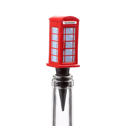 Front view of a novelty bottle stopper, shaped like a red telephone box with a 'TELEPHONE' sign and light blue window panels, shown inserted into a clear glass bottle.