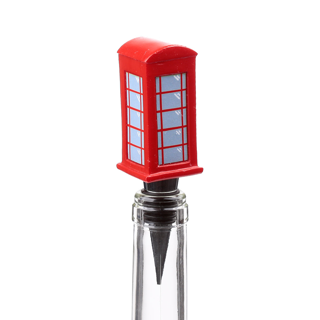 Front-on view of a red telephone box bottle stopper with light blue window panels, inserted into a clear glass bottle neck, on a white background.