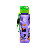 Angled view of a purple Halloween water bottle with a translucent green pop-top lid and carry strap, decorated with white ghosts, black cats, orange pumpkins, bats, and gravestones.