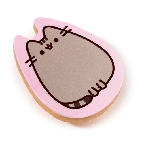 Angled view of a pink, cat-shaped bamboo hair brush, depicting a grey cat illustration with black outlines and a striped tail.