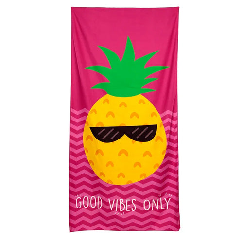 Rectangular pink microfibre beach towel featuring a large yellow pineapple illustration wearing black sunglasses and green leaves, with a lower pink chevron pattern and white 'GOOD VIBES ONLY' text.