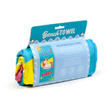 Angled view of a rolled microfibre beach towel, showing colourful sections of yellow and pink, within a light blue packaging sleeve featuring a 'Vacation Vibes' unicorn design.