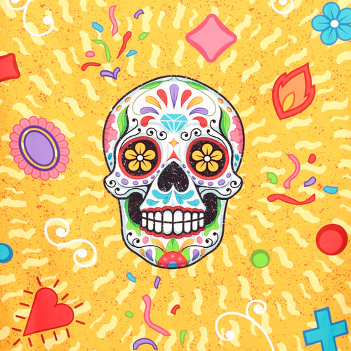 Overhead view of a microfibre beach towel, featuring a vibrant, intricately decorated Day of the Dead sugar skull on a speckled yellow background with scattered colourful festive shapes.