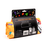 Angled view of a rolled microfibre beach towel, presented in black cardboard packaging. A section of the towel is visible, featuring an orange background with colourful abstract shapes and speckles, plus a small white patterned area. The packaging displays Microfibre Beach Towel, dimensions, and a barcode.