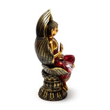Right profile of a red and gold seated Thai Buddha figurine, featuring an ornate lotus base and golden back detail.