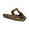 Angled view of a gold and black henna-patterned Buddha hand incense holder, featuring an ashcatcher on the palm.