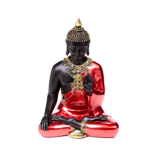 Front view of a decorative Thai Buddha figurine, featuring a black body, glossy red robes, and intricate gold ornamentation, seated in a meditation pose.