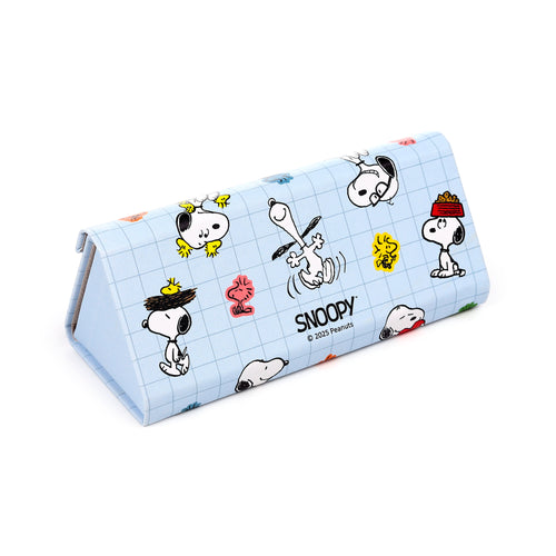 Angled view of a light blue foldable glasses holder, decorated with a grid pattern and multicoloured Snoopy and Woodstock illustrations.
