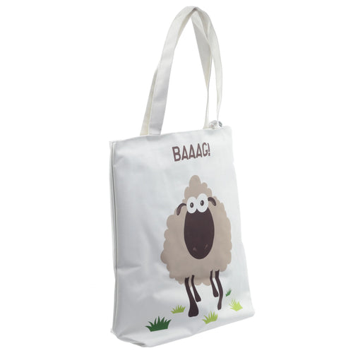 Angled view of a white cotton shopping bag with twin handles, featuring a cartoon sheep design in brown and beige tones, with 'BAAAG!' text above it and green grass detailing.