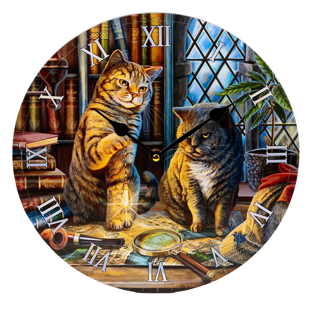 Front view of a circular decorative wall clock, featuring an illustration of two cats in a library with Roman numerals. A tabby cat holds a glowing lantern alongside a grey cat, surrounded by detective-themed items like a magnifying glass, pipe, and books, set against a leaded window.