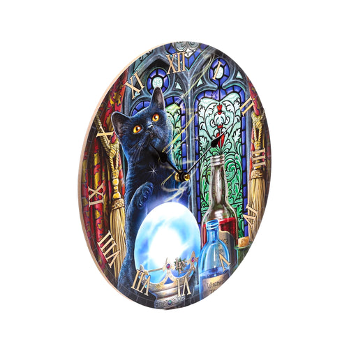 Angled view of a circular wall clock featuring a black cat gazing at a glowing blue crystal ball, against a stained-glass window backdrop, with golden Roman numerals and witchy bottles.