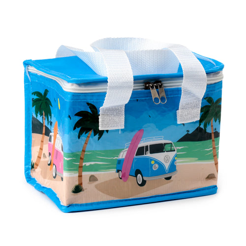 Volkswagen VW T1 Camper Bus themed blue cool bag, angled view showing the front and side. The design depicts a beach scene with a blue camper van and pink surfboard, alongside a pink camper van, palm trees, and ocean waves. Features white carry handles and a zipped top, on a white background.