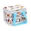 Angled view of a white cool bag with a pattern of various stylised cats in shades of brown, grey, cream, and black. It has light blue webbing handles and a double-zipped top.