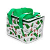 Angled view of a white cool bag featuring a Minecraft Creeper and TNT block pattern with 'SSS...BOOM' text. It has bright green fabric handles and a dark green zip closure.