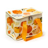 Cream cool bag featuring an autumnal pumpkin and gourd print in orange, yellow, and green, with a visible orange carry strap and top zipper, shown from an elevated angle.