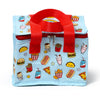 Front view of a light blue cool bag, featuring a colourful Foodiemals cartoon pattern. The pattern displays various food items such as burgers, pizza slices, hot dogs, chips, tacos, burritos, fried chicken, milkshakes, and canned drinks. The bag has red fabric handles and a red zip closure with two silver pulls.