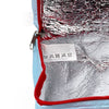 Angled close-up view of an open cool bag's interior, featuring crinkled silver insulation, a red zip, and a white care label mentioning RPET material and 'WIPE CLEAN ONLY'.