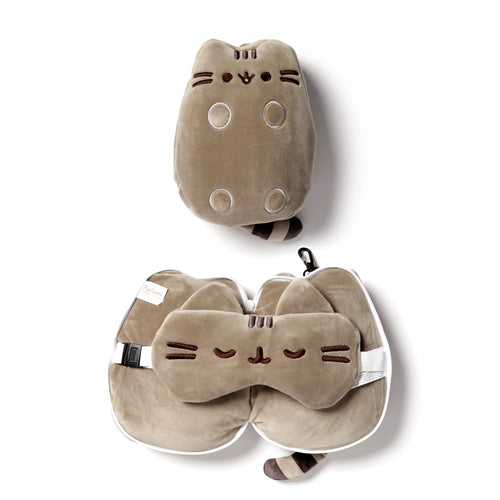 Beige plush cat-shaped travel pillow and eye mask set, featuring brown embroidered details and striped tails, shown both folded compactly and unfurled with the eye mask nestled inside.