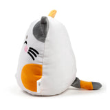 Angled view of a white, grey, and orange plush cat toy, showing its embroidered face with pink cheeks and whiskers, one grey and one orange ear, and a striped tail.