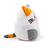 Angled view of a white, orange, and grey plush cat toy, with an embroidered happy face showing pink cheeks, black whiskers, and a striped tail.