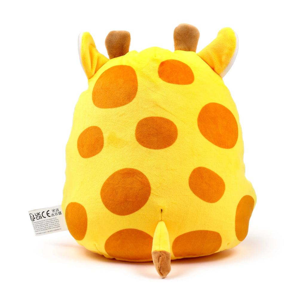 Back view of a yellow giraffe plush toy with orange spots, showing its soft tail and brown ossicones.