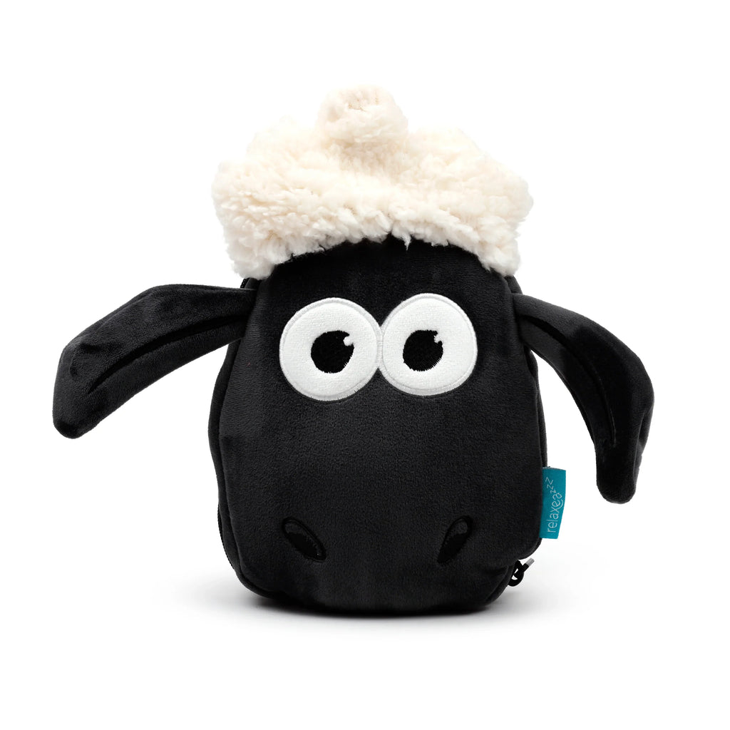 Front view of a Relaxeazzz Shaun the Sheep character travel pillow, featuring black plush, a white fluffy head, and embroidered eyes.