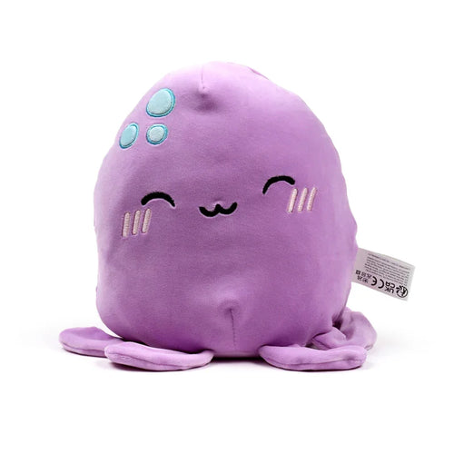 Front view of a purple Squidglys Adoramals Wendy the Octopus plush toy, featuring an embroidered smiling face, light blue head patches, and visible tentacles.