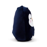 Angled view of a navy blue Squidglys plush penguin toy, showing its soft texture and a partial white face with an orange beak, black eye, and pink blush details, against a white background.