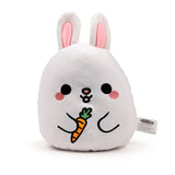 Front view of a white rabbit plush toy with large black eyes, pink cheeks, and floppy ears, holding an embroidered orange carrot.