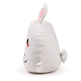 Angled view of a white Adoramals Pets Frances the Bunny plush toy, with a pink inner ear, embroidered black eye, pink cheek blush, smiling mouth, and a fluffy white tail.