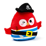 Front view of a red pirate plush toy, featuring a black hat with white skull and crossbones, blue and white striped body, black belt with a yellow buckle and cutlass, and a winking eye.