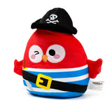 Front view of a red Squidglys pirate plush toy with a black skull and crossbones hat, winking eye, blue and white striped body, and a black belt with a yellow buckle.