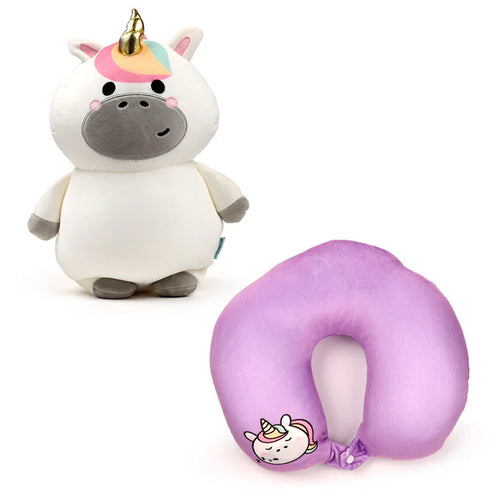 Front view of a white unicorn plush toy with a golden horn and rainbow-coloured mane; alongside, a lavender U-shaped travel pillow featuring an embroidered sleepy unicorn face, displayed at an angle.