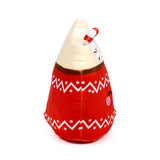 Angled view of an Aspen Hot Chocolate plush toy, featuring a red mug-like base with white zigzag patterns and dots, a cream whipped topping, and a red and white candy cane. An embroidered winking eye and pink cheek blush are visible on the side.